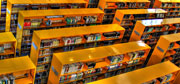 Photograph of Orange shelves in a library.